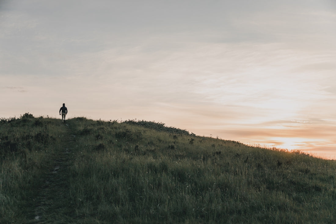 person on top of mountain
