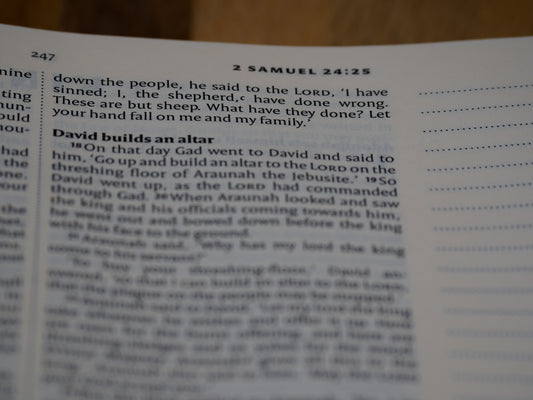 a close up of a book with a page in it