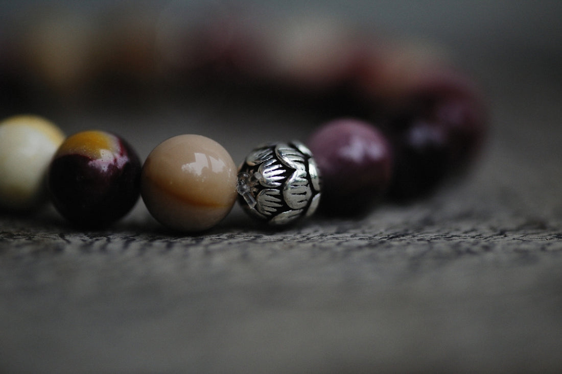 a close up of a bracelet with beads
