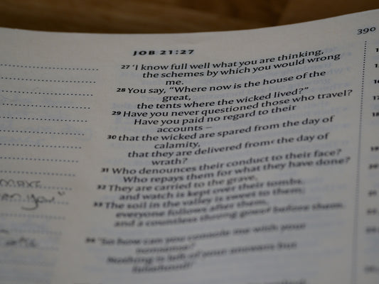 a close up of a book with a poem on it