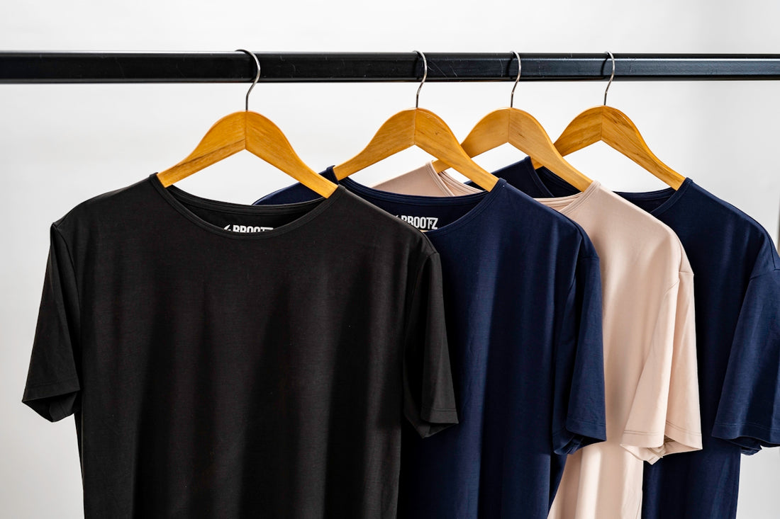 a group of blue and yellow shirts on a swinger