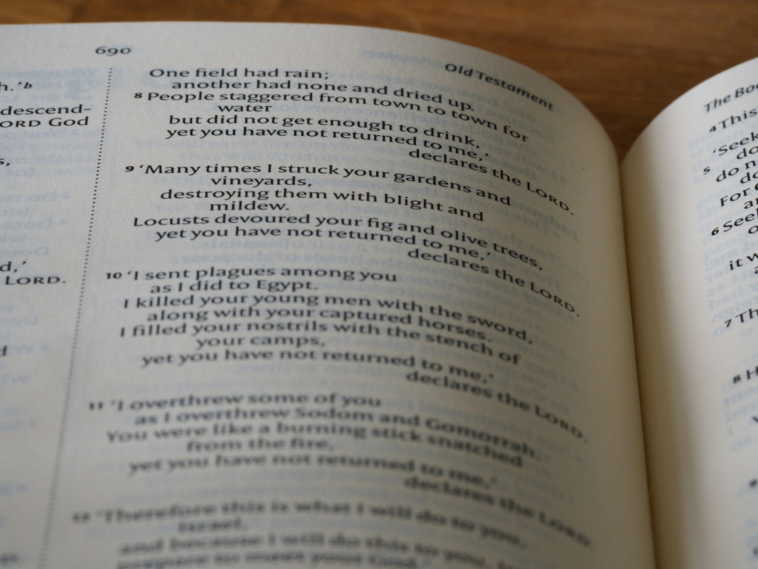 a close up of an open book on a table