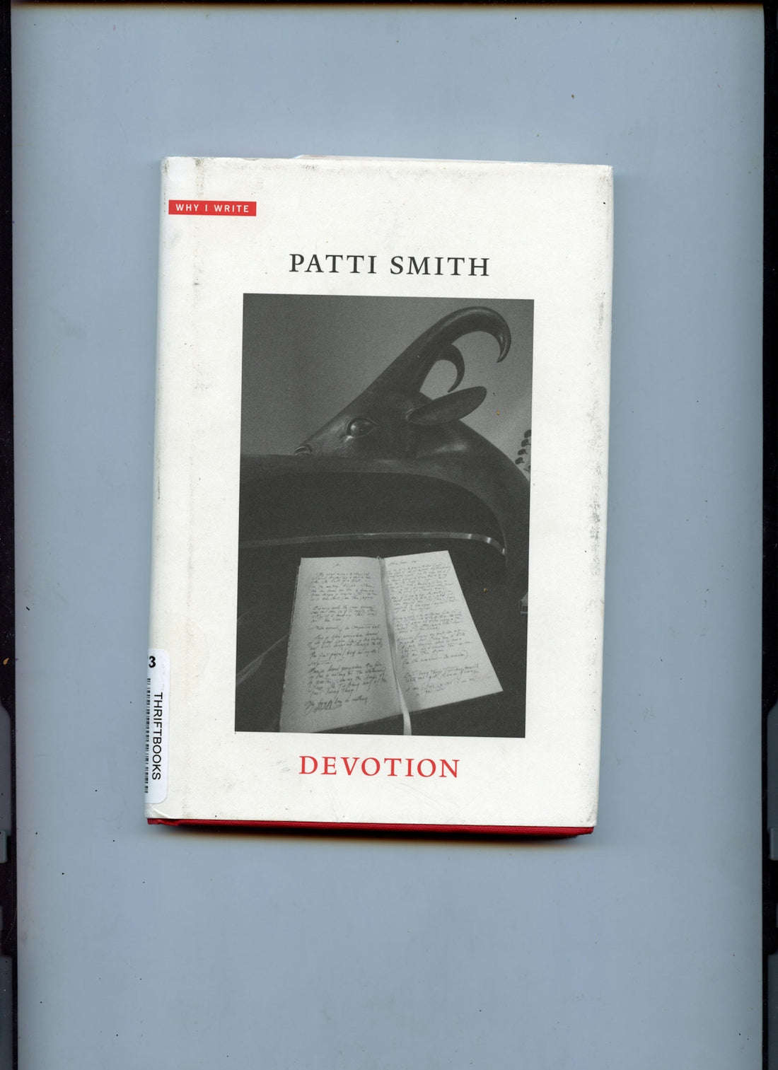 A book cover for patti smith's devotion.