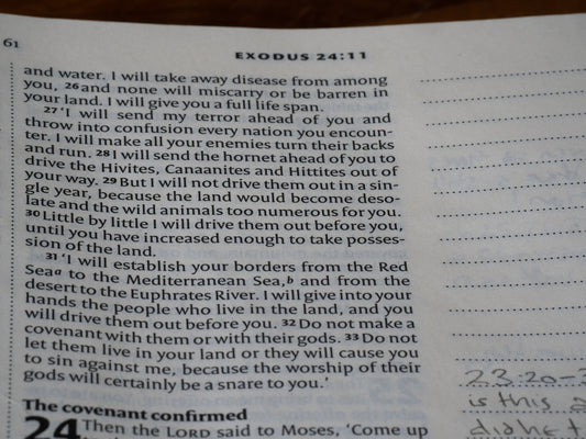 Text from the book of exodus on a page.